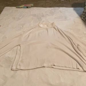 White long sleeve turtleneck shirt.